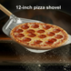 Pizza being lifted from oven